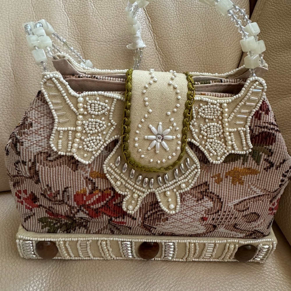 Jacquard summer purse with exclusive details